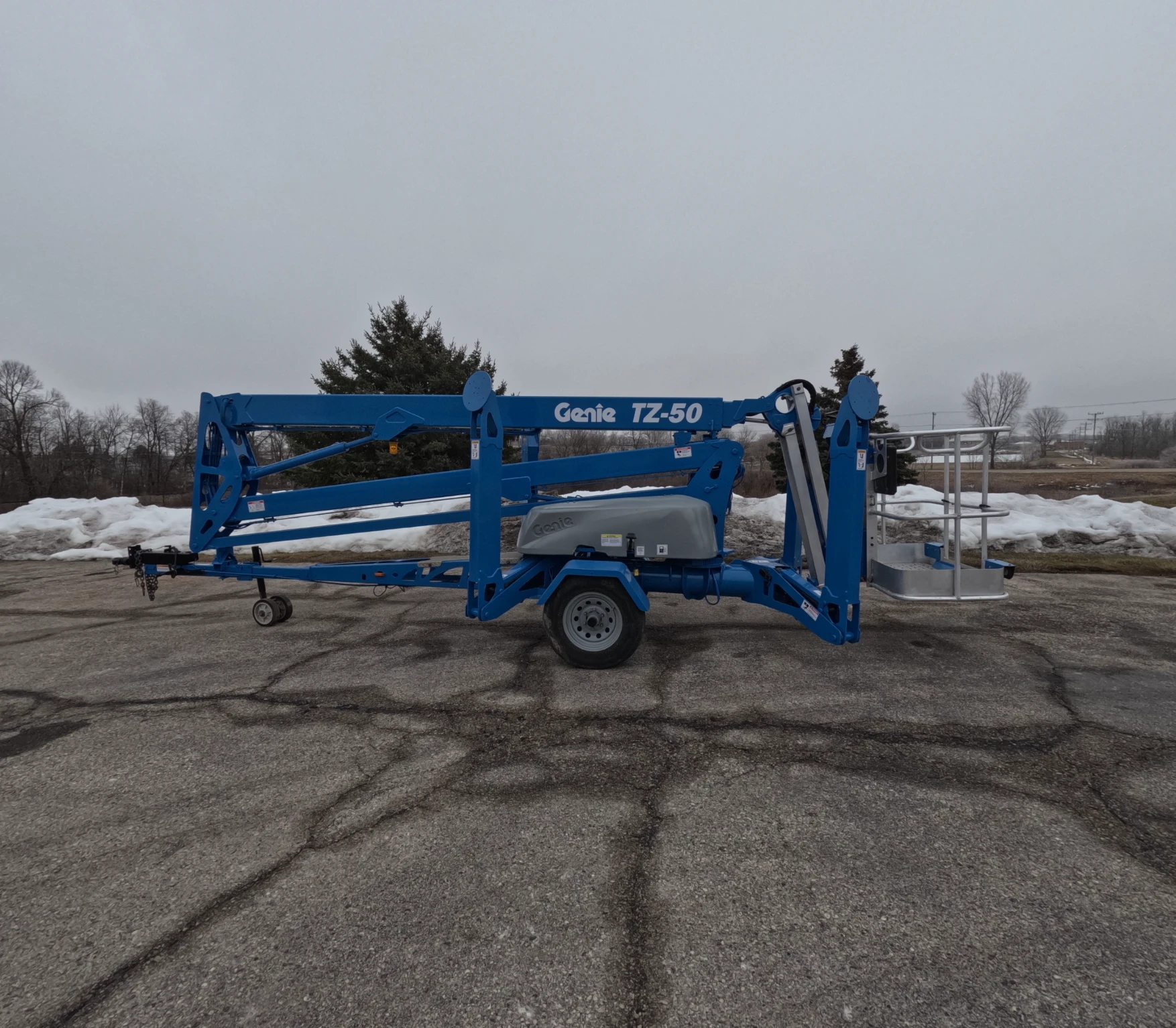 Used Genie TZ50 TowBehind Boom Lift Stack Equipment